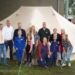 Foto: V.l.n.r.: voorzitter Remko Borkhuis, penningmeester Jan Geert Wind penningmeester, Hans Paul Heuvelman van de services commissie en bestuur vrijwilligers en kinderen van Lutje Grut.