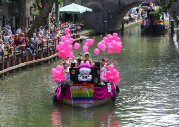 Photo by FransA: https://www.pexels.com/photo/people-on-boat-with-pink-balloons-1148996/